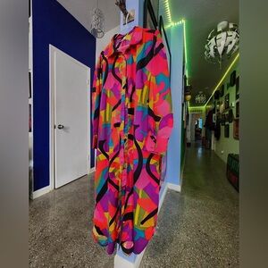 Multi colored longline blouse. New with tags. Wmns 1x